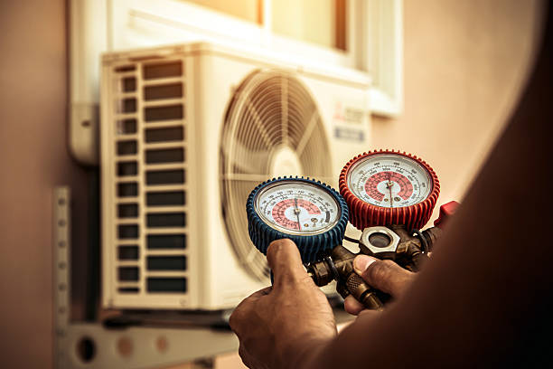 Professional Heat Pump Repair technician working in Glenville, PA